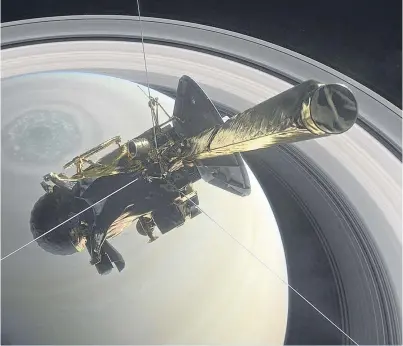  ??  ?? Cassini above Saturn’s northern hemisphere. Picture: PA.