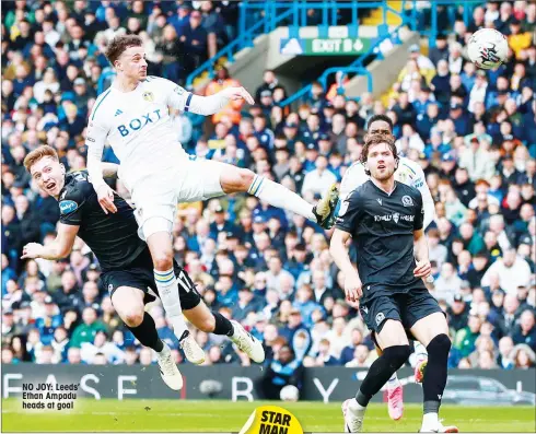  ?? ?? NO JOY: Leeds’ Ethan Ampadu heads at goal