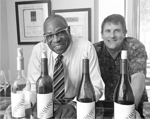  ??  ?? Baker, left, and his wine maker, Chik Brenneman, with Baker Family Wines. — WP-Bloomberg photo