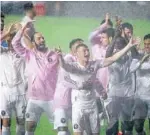  ?? JOHN MCCALL/SOUTH FLORIDASUN SENTINEL ?? Inter Miami CF players celebrate after beating FC Cincinnati on Nov. 8 in Fort Lauderdale.