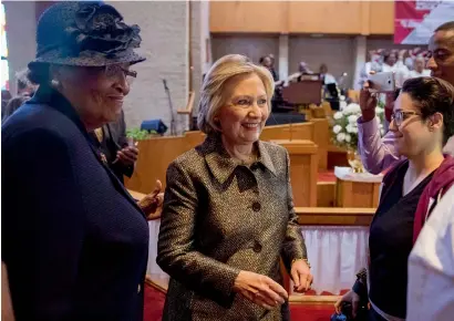  ?? AP ?? Democratic presidenti­al candidate Hillary Clinton takes her seat after speaking at the Little Rock AME Zion Church in Charlotte. —