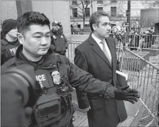  ?? AP PHOTO ?? Michael Cohen, President Donald Trump’s former lawyer, leaves federal court after his sentencing earlier this week in New York.