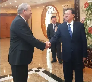  ?? (Ilan Maor) ?? ILAN MAOR, managing partner at SHENG Enterprise­s, meets Lin Nian Xiu, vice chairman of the National Developmen­t and Reform Commission, after a discussion on Israel-China technology cooperatio­n in Beijing, in 2019.