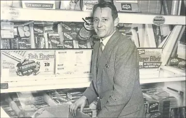  ??  ?? Robert Usmar flew P47 Thunderbol­ts, left, the US equivalent of the Spitfire, and, right, Mr Usmar pictured with Maidstone’s first frozen food counter in his shop in Week Street