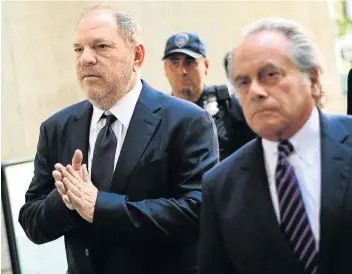  ?? Picture: Don EMMERT/ AFP ?? NOTHING TO CHEER ABOUT: In this file photo taken on June 5 2018, film producer Harvey Weinstein, left, enters Manhattan Criminal Court in New York. The disgraced Hollywood mogul has been accused of sexual harassment and assault by almost 80 women, turning him into the catalyst of the global #MeToo movement.