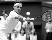  ?? TIM IRELAND/AP ?? Third-seeded Roger Federer is one of seven men 30 or older who will play in Monday’s round of 16 at Wimbledon.