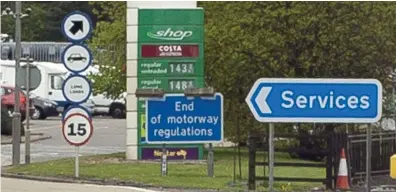  ??  ?? Over the odds: Drivers forced to fill up on the motorway face paying sky-high prices