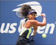  ?? Seth Wenig / Associated Press ?? Naomi Osaka returns a shot to Victoria Azarenka during the women’s singles final of the U.S. Open in 2020.