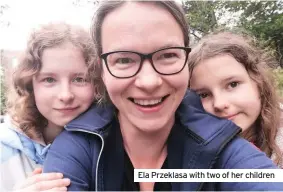  ??  ?? Ela Przeklasa with two of her children