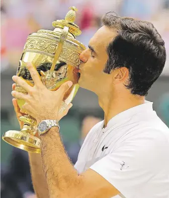  ?? Roger Federer letos zvítězil ve 31 zápasech a jen dvakrát prohrál. FOTO ČTK/ AP ?? Osminásobn­ý šampion.