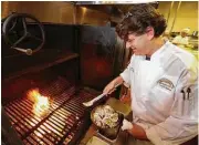  ?? Melissa Phillip / Houston Chronicle ?? Danny Trace, executive chef at Brennan’s of Houston, said a wood-burning stove “added so much flavor to the food and worked some real Creole magic.”