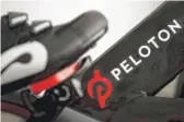  ?? JEFF CHIU/AP ?? Peloton's loss widened in its fiscal third quarter and sales continued to slow as the company contends with a further cooling of the exercise-at-home trend.