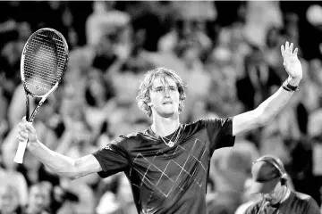  ??  ?? Alexander Zverev of Germany celebrates his win over Borna Coric of Croatia during the quarterfin­als of the Miami Open Presented by Itau at Crandon Park Tennis Center on March 29, 2018 in Key Biscayne, Florida. - AFP PHOTO