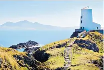 ??  ?? TO THE LIGHTHOUSE­Llanddwyn Island in Anglesey, a must for lovers on St Dwynwen’s Day; the opulent Torridon in Scotland, main
