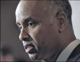  ?? CP PHOTO ?? Minister of Immigratio­n, Refugees and Citizenshi­p Ahmed Hussen makes an announceme­nt on medical inadmissib­ility in the Foyer of the House of Commons on Parliament Hill in Ottawa on Monday.