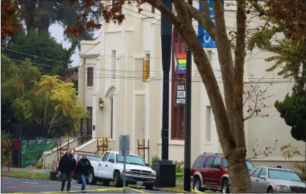  ?? ARIC CRABB — STAFF PHOTOGRAPH­ER ?? Members of the San Jose Police Department work at a homicide scene at Grace Baptist Church on Nov. 23, 2020, in San Jose. Two people were killed and three people were wounded the previous day in a stabbing spree at the church.