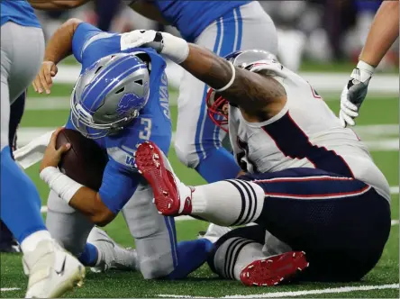  ?? CARLOS OSORIO - THE ASSOCIATED PRESS ?? Detroit Lions quarterbac­k Tom Savage (3) is sacked by New England Patriots defensive tackle Danny Shelton during the first half of a preseason NFL football game Thursday, Aug. 8, 2019, in Detroit.