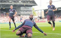  ?? REUTERS ?? Arsenal’s Alexandre Lacazette celebrates scoring their second goal.