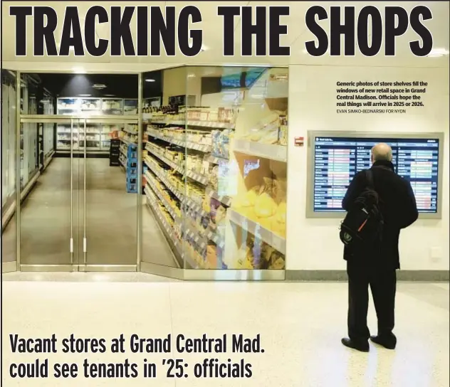  ?? EVAN SIMKO-BEDNARSKI FOR NYDN ?? Generic photos of store shelves fill the windows of new retail space in Grand Central Madison. Officials hope the real things will arrive in 2025 or 2026.