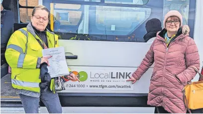  ?? ?? ● Claire Sykes (right), with fellow protester Sophie Benson and their petition against changes to Rochdale’s Kingsway Local Link bus service