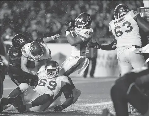  ?? JUSTIN TANG/THE CANADIAN PRESS ?? Kienan LaFrance, shown scoring a touchdown for the Roughrider­s on Friday, made several key runs in an 18-17 victory over the host Ottawa Redblacks.