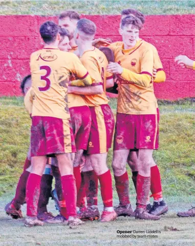  ?? ?? Opener Darren Liddell is mobbed by team-mates