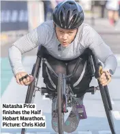  ?? Picture: Chris Kidd ?? Natasha Price finishes the Half Hobart Marathon.