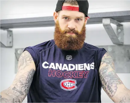  ?? JOHN MAHONEY ?? Montreal Canadiens defenceman Jordie Benn showed off some of his tattoos after a training camp session at the Bell Sports Complex in Brossard on Friday, noting one tattoo in particular holds great meaning.