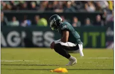  ?? MATT SLOCUM — THE ASSOCIATED PRESS ?? Eagles quarterbac­k Jalen Hurts squats after a play in Sunday’s game against Kansas City. As the Eagles search for an identity, they’d like to avoid it being one of a 1-4 team after Sunday’s trip to Carolina.