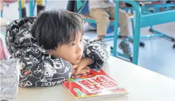  ?? FOTO: GONNERMANN ?? Für chinesisch­stämmige Kinder aus der gesamten Region gibt es jeden Samstag die Möglichkei­t, die Sprache ihrer Eltern zu lernen.