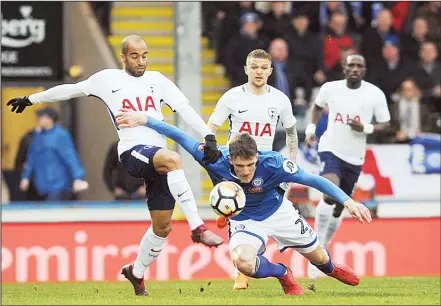  ??  ?? Tottenham’s Loucas Moura (left), and Rochdale’s Ryan Delaney challenge for the ball during the English FA Cup fifth round soccer match between Rochdale AFC and Tottenham Hotspur at the Crown Oil Arena in Rochdale, England, on Feb 18. (AP)