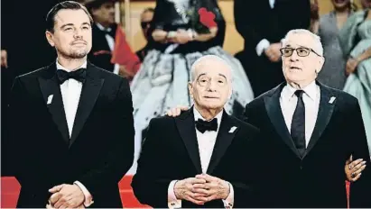  ?? LOIC VENANCE / AFP ?? Unos elegantes Leonardo Dicaprio, Martin Scorsese y Robert De Niro, a su llegada al teatro Lumière