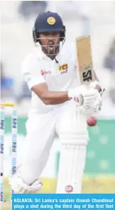  ??  ?? KOLKATA: Sri Lanka’s captain Dinesh Chandimal plays a shot during the third day of the first Test between India and Sri Lanka at the Eden Gardens cricket stadium in Kolkata yesterday. —AFP