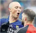  ??  ?? TITANIC TUSSLE Kieran Donaghy and Aidan O’shea face off last week