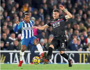  ?? — Reuters ?? That’s mine: Crystal Palace’s Joel Ward (left) vying for the ball with Brighton’s Jose Izquierdo during the English Premier League match at the Amex Stadium on Tuesday.