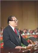  ?? ?? Jiang Zemin delivers a report at the 14th National Congress in Beijing on Dec 12, 1992.