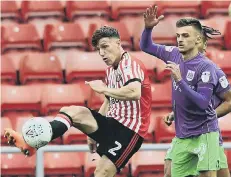  ??  ?? Billy Jones beats Bristol City’s Jamie Paterson in October’s SoL clash.