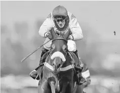  ??  ?? File photo of Robbie Power on Fox Norton during the 3.25 JLT Melling Chase at Aintree Racecourse, Merseyside, England in this April 7 file photo. — Reuters photo