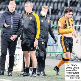  ?? CAMERASPOR­T - ALEX DODD ?? Hull City’s Lewie Coyle leaves the field injured