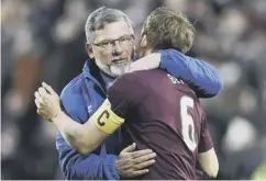  ??  ?? 0 Craig Levein celebrates the Scottish Cup victory over Hibs.