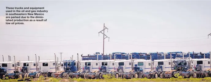  ?? ROBERTO E. ROSALES/JOURNAL ?? These trucks and equipment used in the oil and gas industry in southeaste­rn New Mexico are parked due to the diminished production as a result of low oil prices.