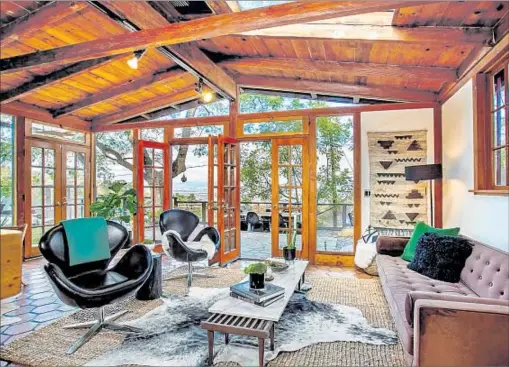  ?? John Aaroe Group ?? FORMER PUDDLE of Mudd bassist Doug Ardito is asking $1.199 million for his 1,269-square-foot Hollywood Hills post-and-beam.