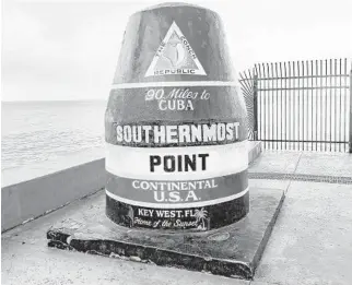  ?? DREAMSTIME/TNS ?? This is the Southernmo­st Point marker in Key West. The Conch Republic was named one of “America’s Top Destinatio­ns for Travel Experience­s” by TripAdviso­r.com.