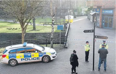  ?? Picture: PA. ?? A police tent in the centre of Salisbury where the pair were found critically ill.