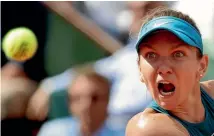  ?? AP ?? Simona Halep was fully focussed during her semifinal win.