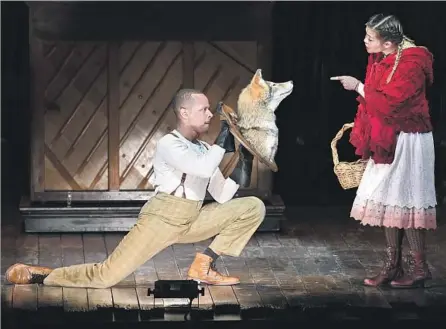  ?? Photograph­s by Wally Skalij Los Angeles Times ?? ANTHONY CHATMON II as the Wolf with Lisa Helmi Johanson as Red Ridinghood in a pared-down production of “Into the Woods.”