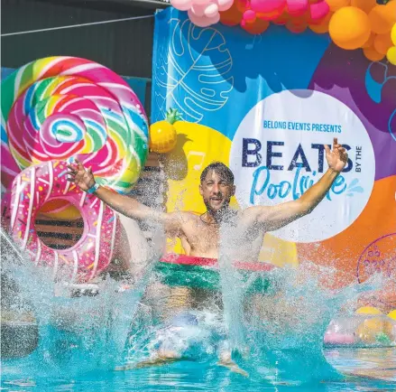  ?? Picture: Glenn Campbell ?? Ryan Amos cooling off in true Territory style at Beats By The Poolside at Darwin Ski Club.