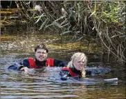  ?? JENS DRESLING / RITZAU ?? Police search a waterway for body remains related to the ongoing Kim Wall murder investigat­ion on the west coast of Amager, close to Copenhagen, Denmark, on Wednesday.