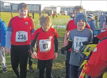  ??  ?? Connah Wright, Ruaridh Lindsay-Smith and Archie Gunyadi prepare for their race.