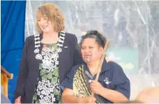  ??  ?? LEFT: Tararua District Mayor Tracey Collis waiting to deliver her speech with Evelyn Chase from Eketahuna.